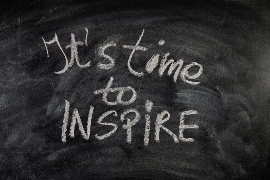 board, writing, chalk with the words "it's time to inspire"